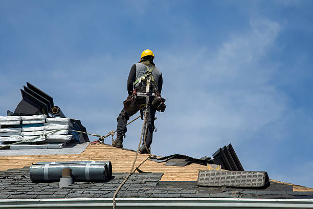Professional Storm Damage Roof Repair technician working in Burrows, IN